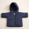 Campera de matelassé azul con capucha | Tienda Olivia Uruguay