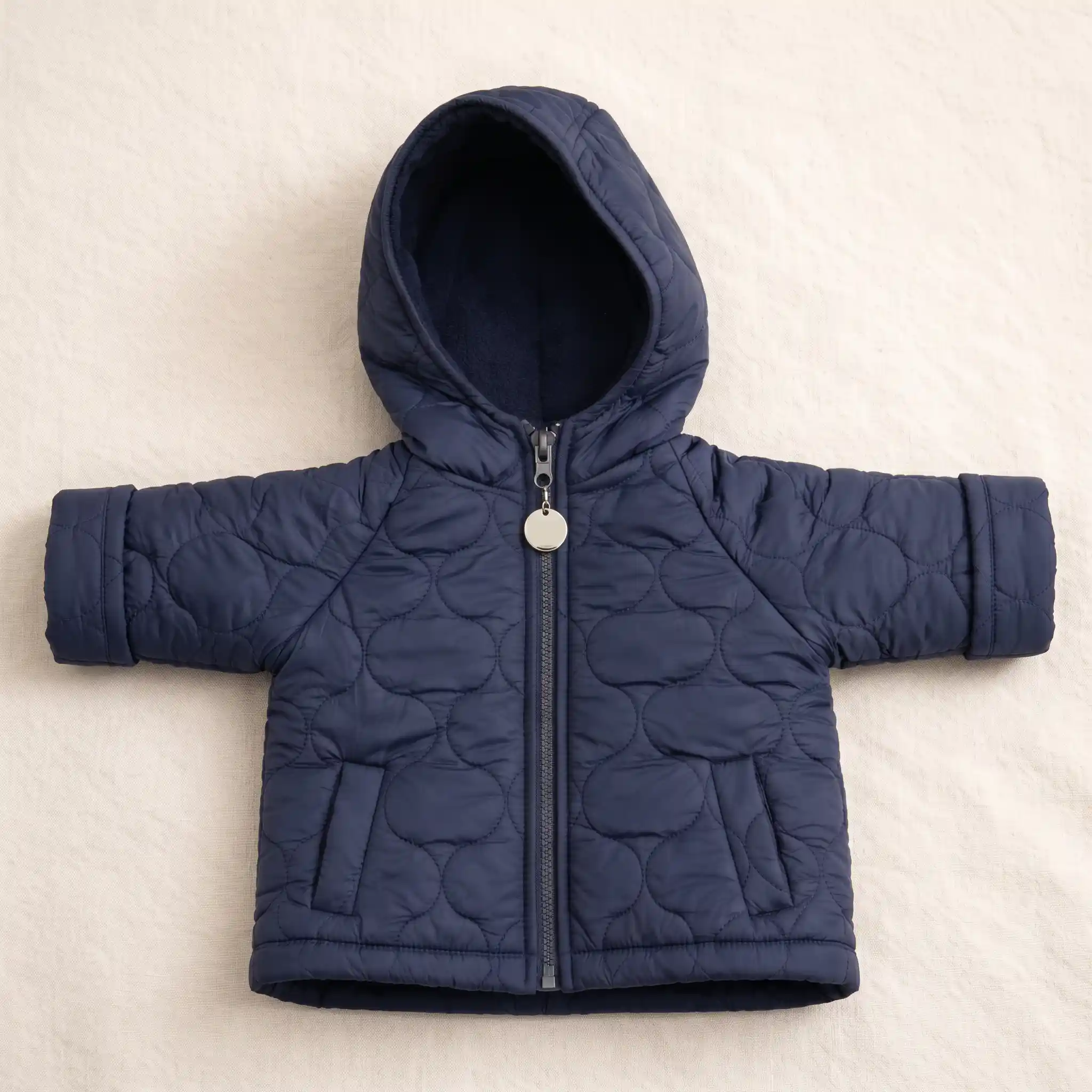 Campera de matelassé azul con capucha | Tienda Olivia Uruguay