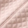 enterito mameluco de invierno de bebé color rosa, cuello redondo y broches frontales en Uruguay.
