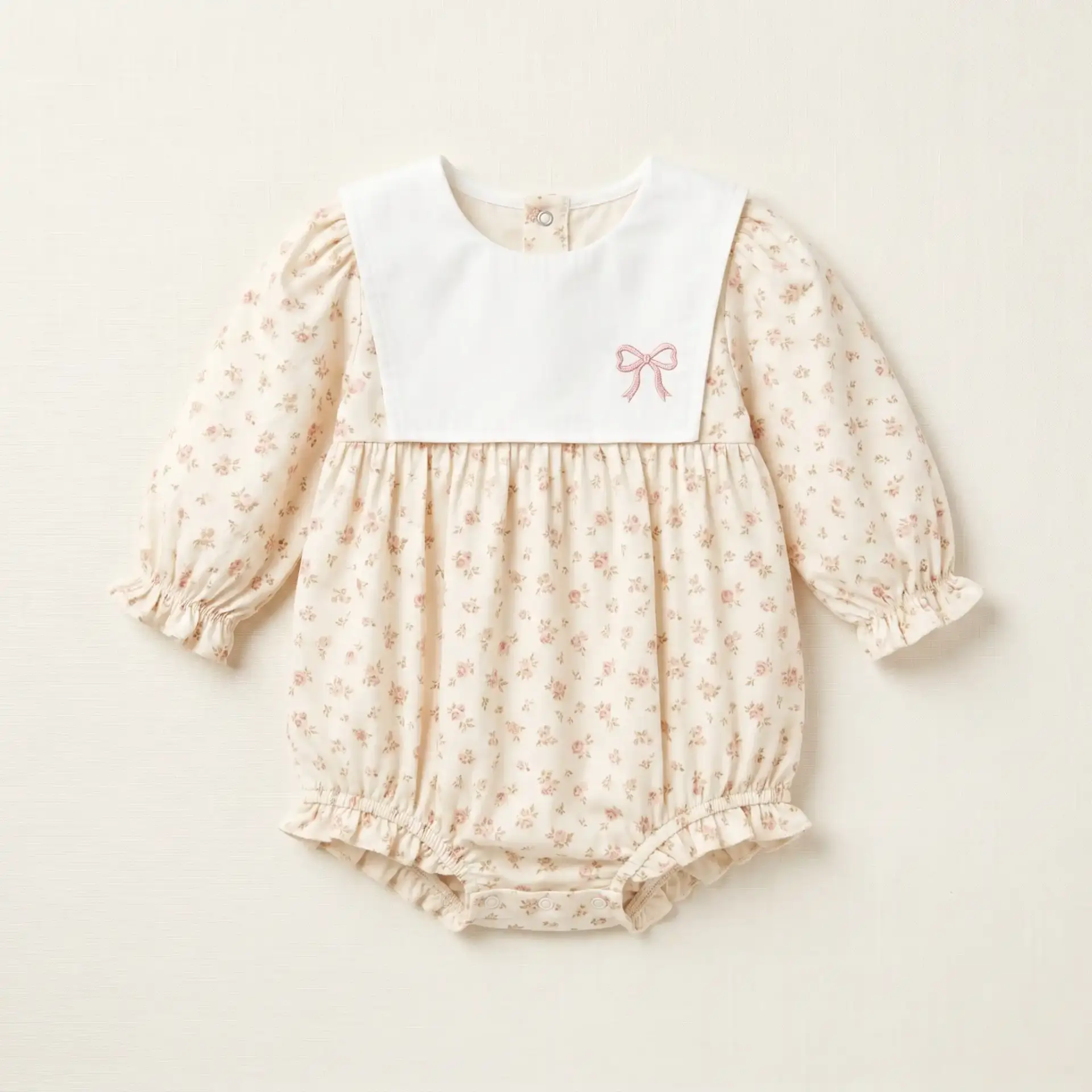Vestido body floral de bebé